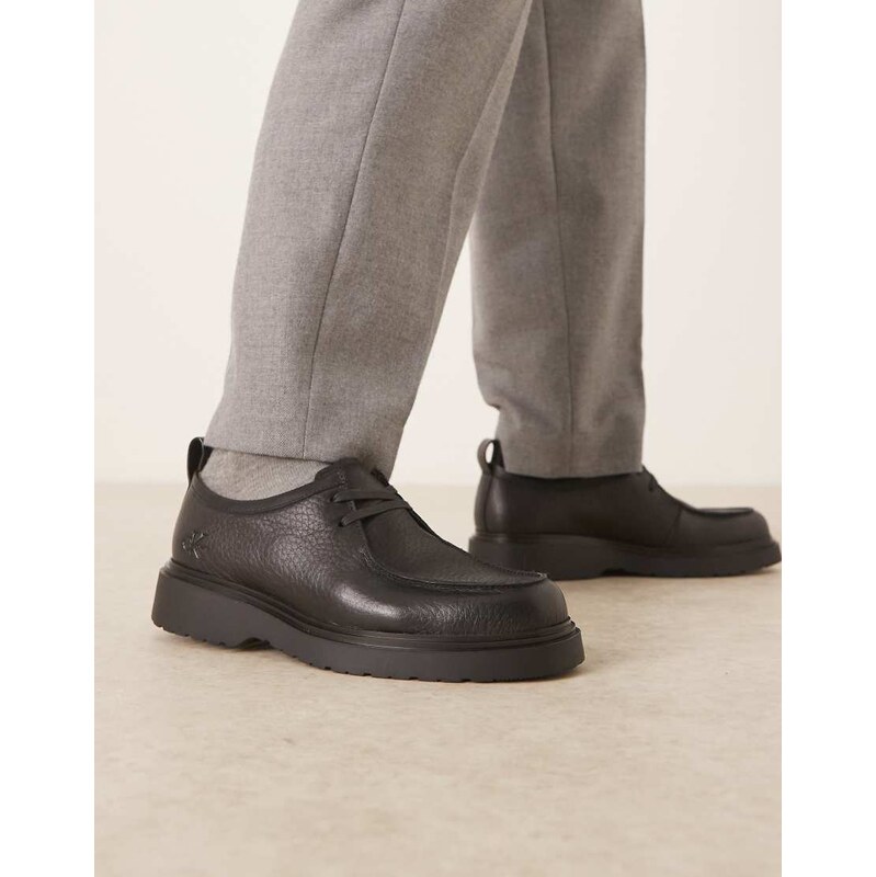 Calvin Klein combat lace up leather shoes in black