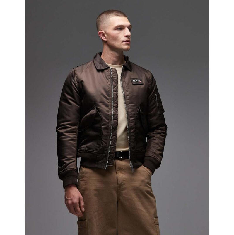 Schott logo patch detail zip pocket detail cropped padded jacket