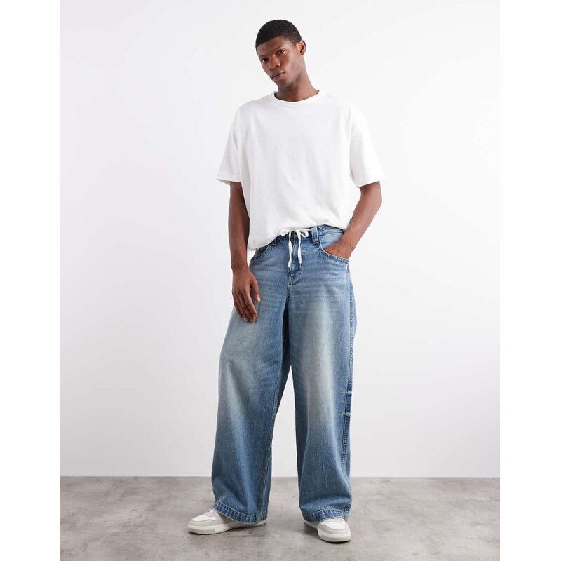 ASOS DESIGN loose fit jeans with embroidered back pocket in