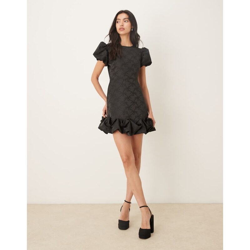 Sister Jane puff sleeve ruffle hem mini dress in black bow print