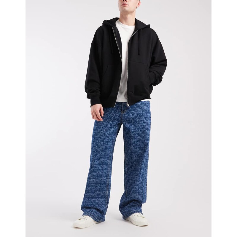 Tommy Jeans Theo baggy jeans with all over print in mid wash