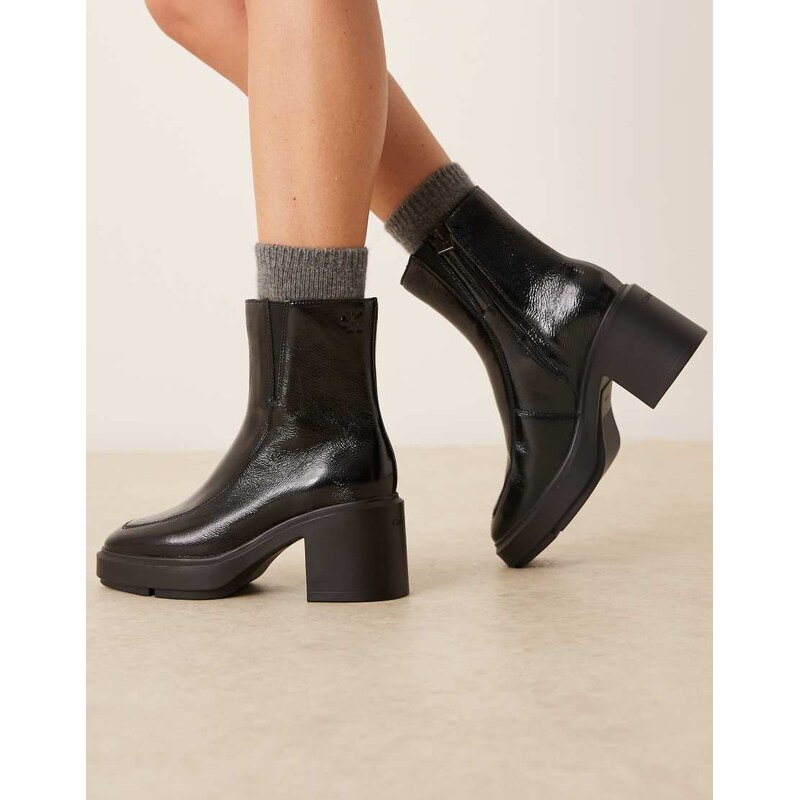 Calvin Klein 100% leather block heel ankle boots in black 110435040