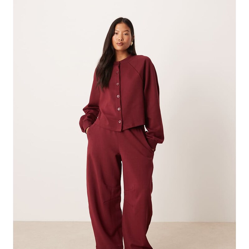 ASOS Petite ASOS DESIGN Petite interlock barrel leg jogger in burgundy 110556136