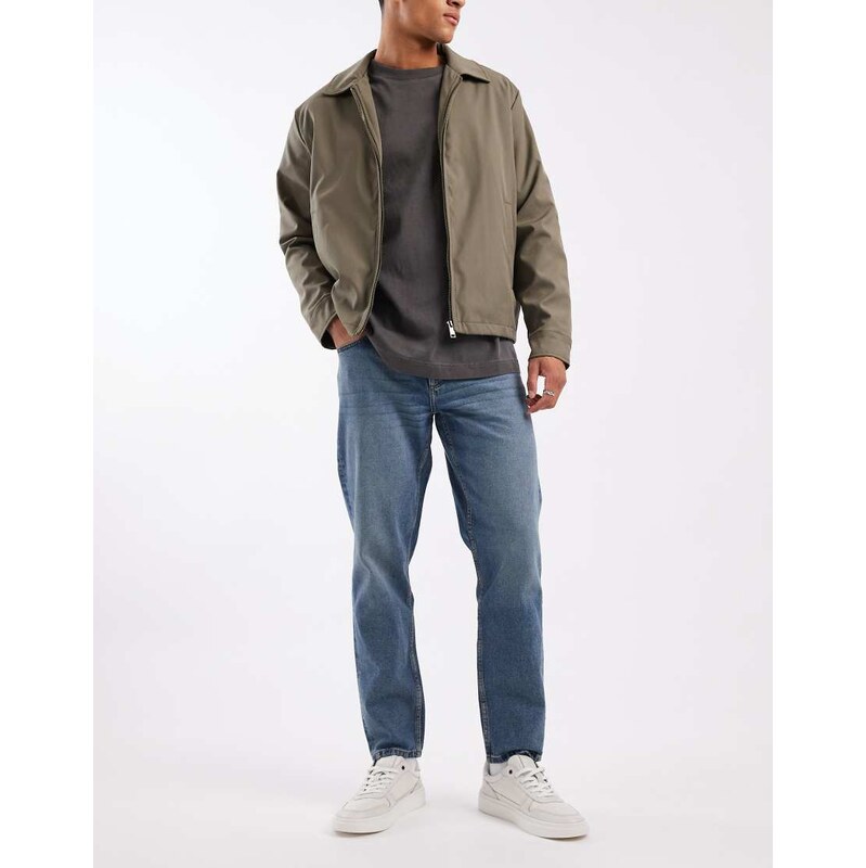 ASOS DESIGN tapered jeans in mid wash blue