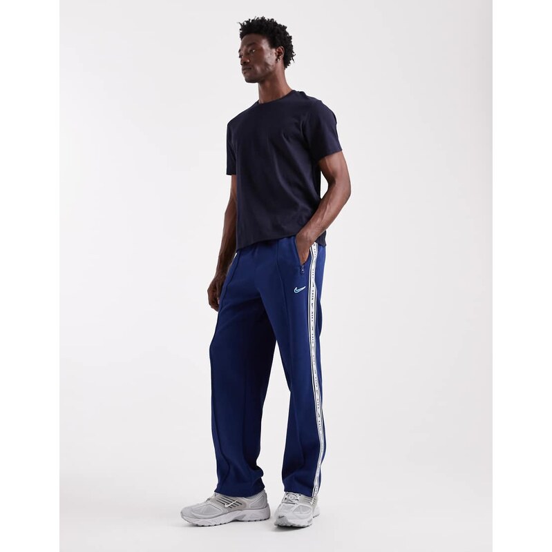 Nike striped tapered joggers in navy
