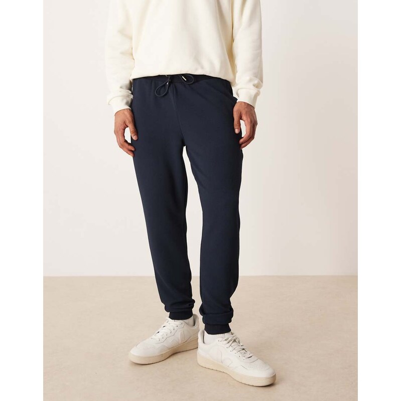 ASOS DESIGN slim fit jogger in jaquard texture in navy