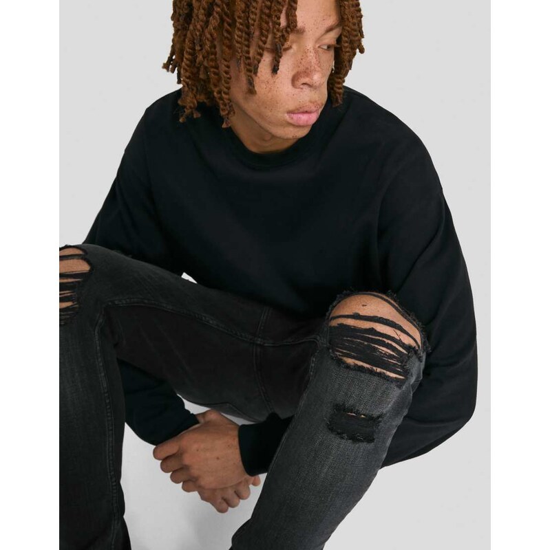 Bershka Ripped superskinny jeans in black