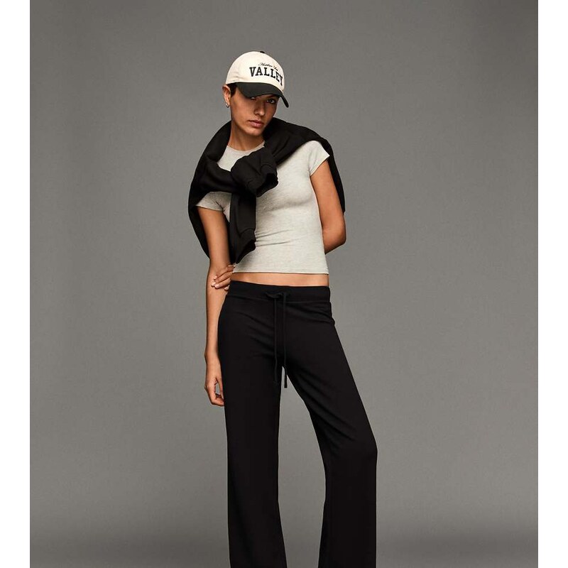 Bershka Petite plush jersey trousers in black