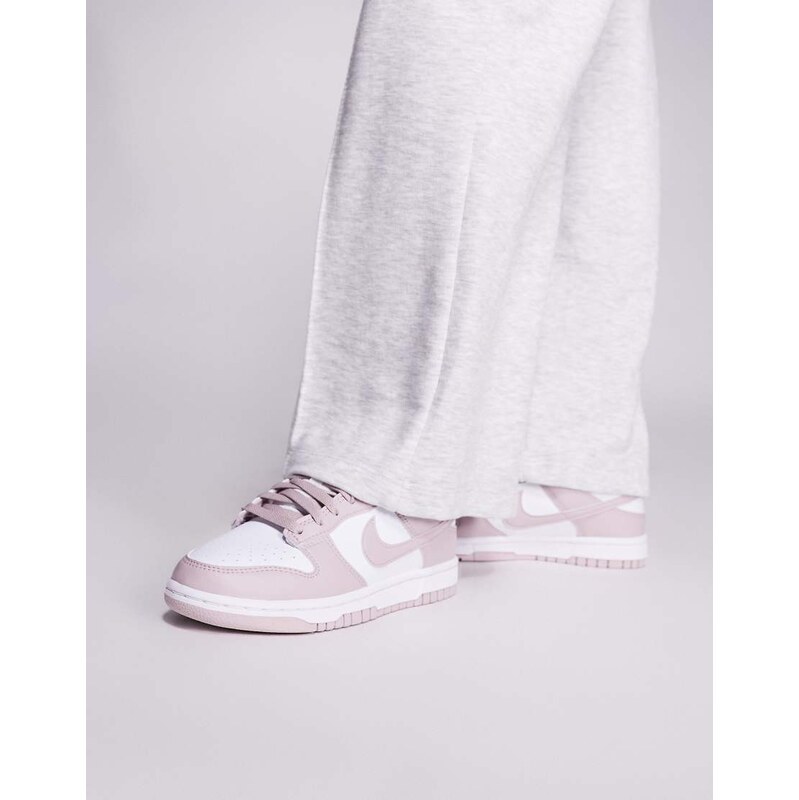 Nike Dunk Low trainers in white and pink