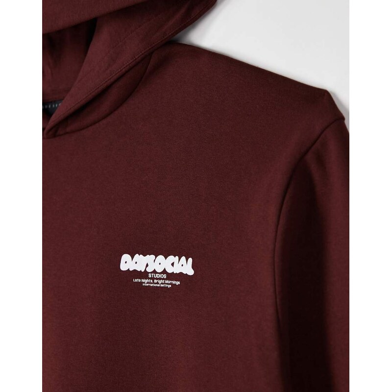 ASOS DESIGN relaxed boxy hoodie with bubble text print in rust-Brown