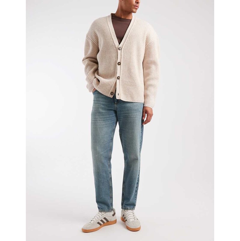 ASOS DESIGN tapered jeans in dark wash blue with tint
