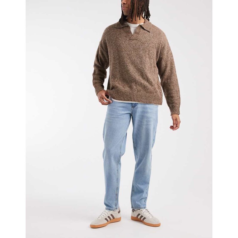 ASOS DESIGN tapered jeans in light wash blue