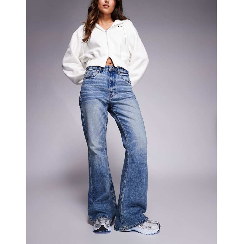 ASOS DESIGN 90s flare jean in mid wash blue