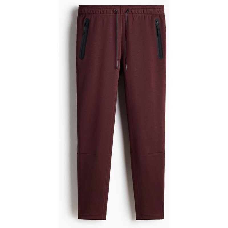 H&M - Sportovní kalhoty jogger Slim Fit DryMove - Vínová