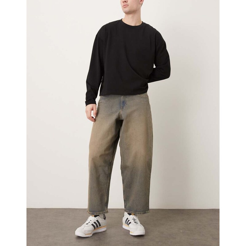 ASOS DESIGN oversized tapered jeans in mid wash blue with brown