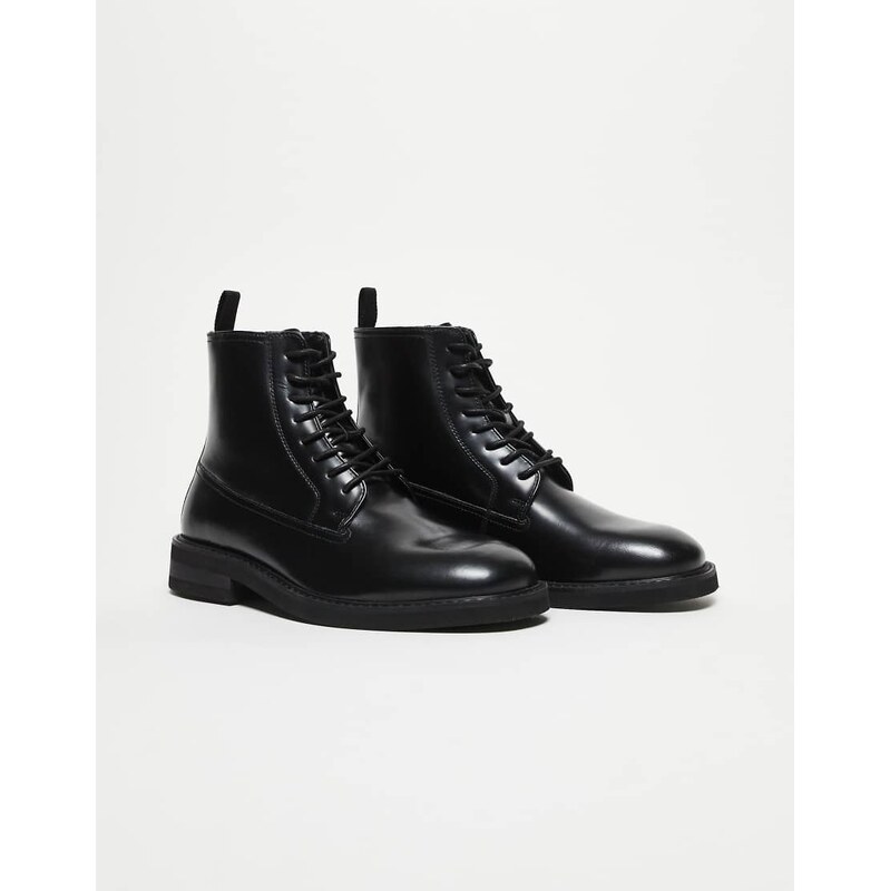 ASOS DESIGN lace up boots in black leather on cleated sole