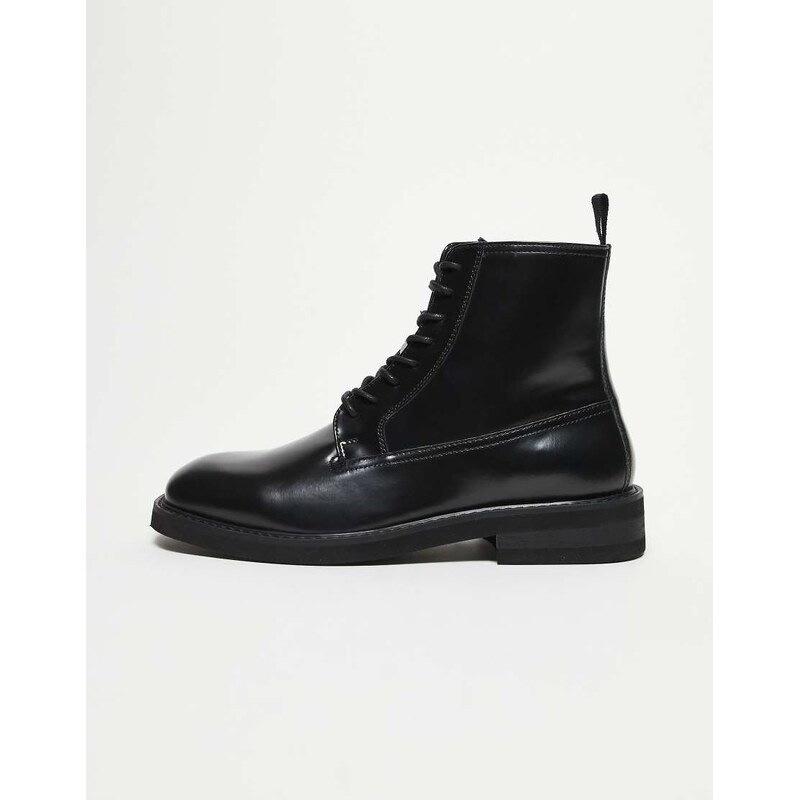 ASOS DESIGN lace up boots in black leather on cleated sole