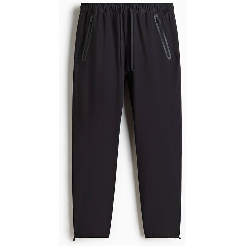 H&M - Sportovní kalhoty jogger DryMove - Černá