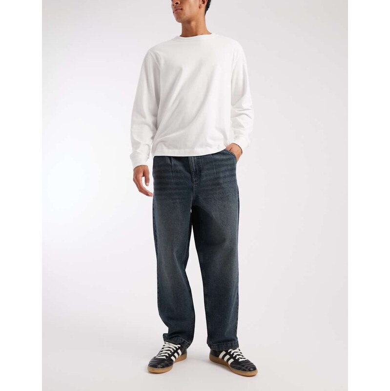 ASOS DESIGN relaxed tapered fit jeans in dark wash blue