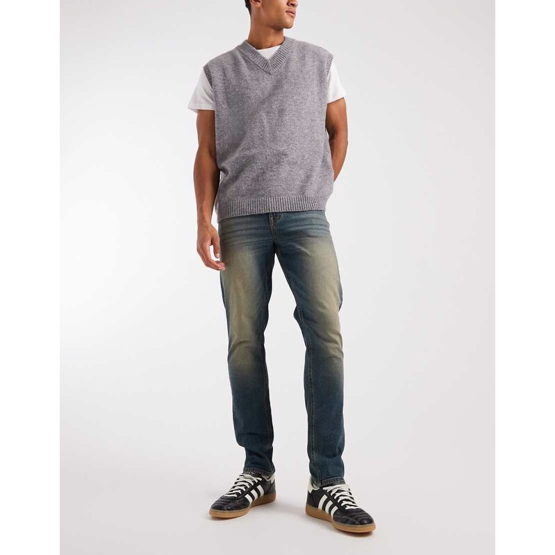 ASOS DESIGN skinny jeans in dark wash blue with tint
