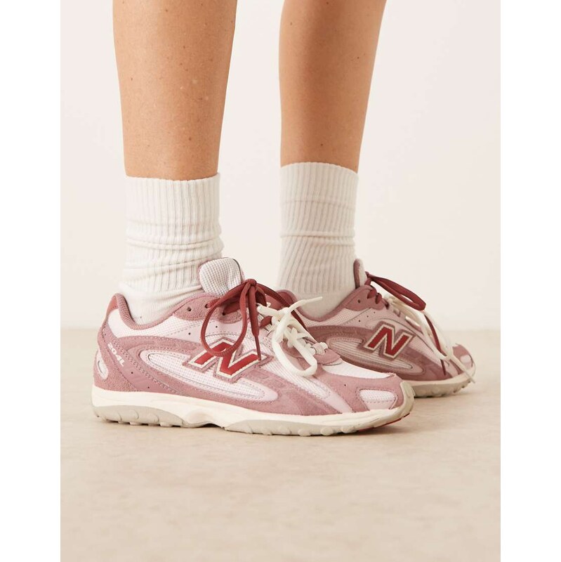 New Balance 204L trainers in rose pink suede