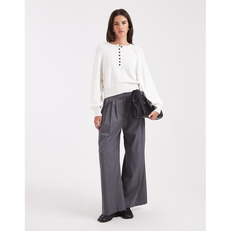 ASOS DESIGN knitted long sleeve henley jumper with contrast buttons in cream-White