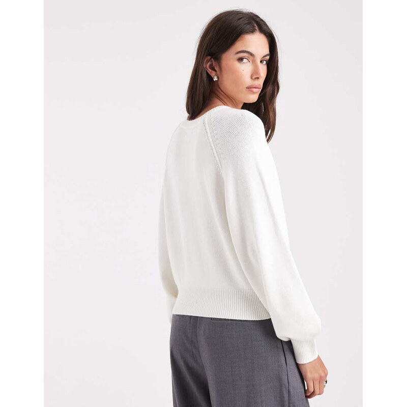 ASOS DESIGN knitted long sleeve henley jumper with contrast buttons in cream-White