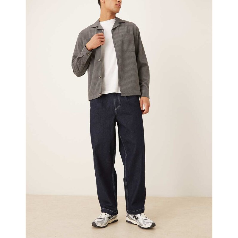 ASOS DESIGN relaxed tapered fit jeans with pleat detail in black