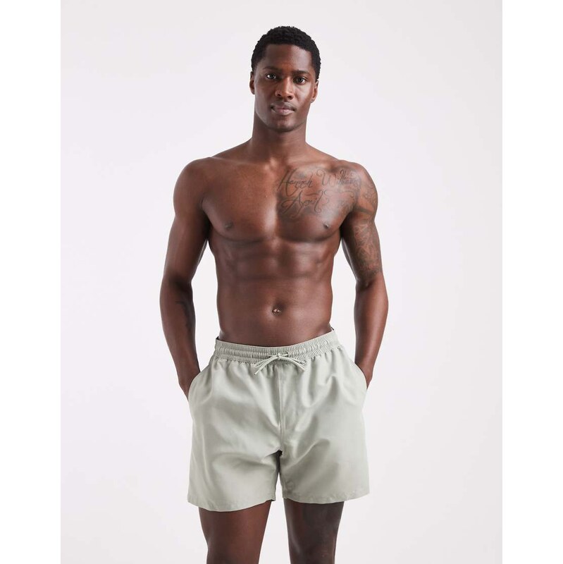 ASOS DESIGN swim shorts in mid length in sage green