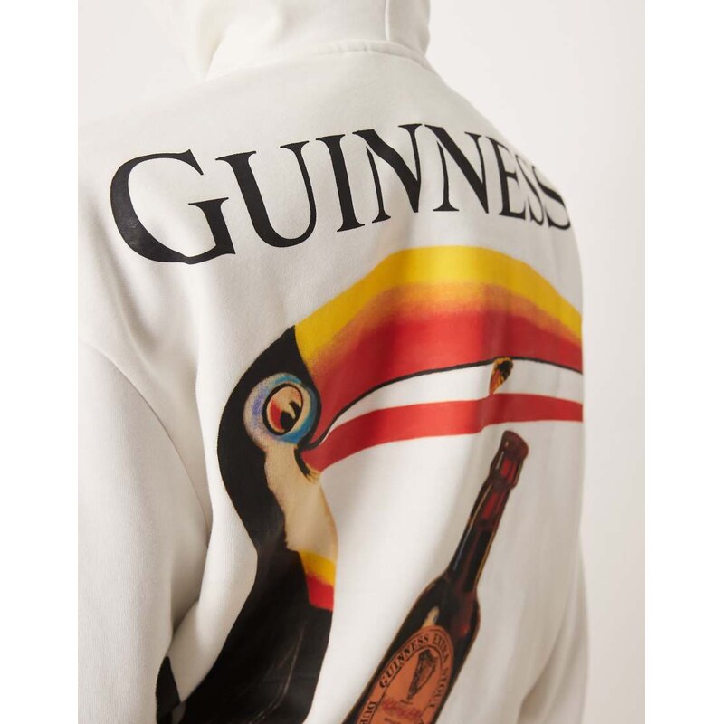 ASOS DESIGN unisex relaxed hoodie with Guinness print in cream-White