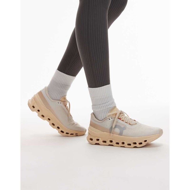 ON Cloudmonster 1 running trainers in orange
