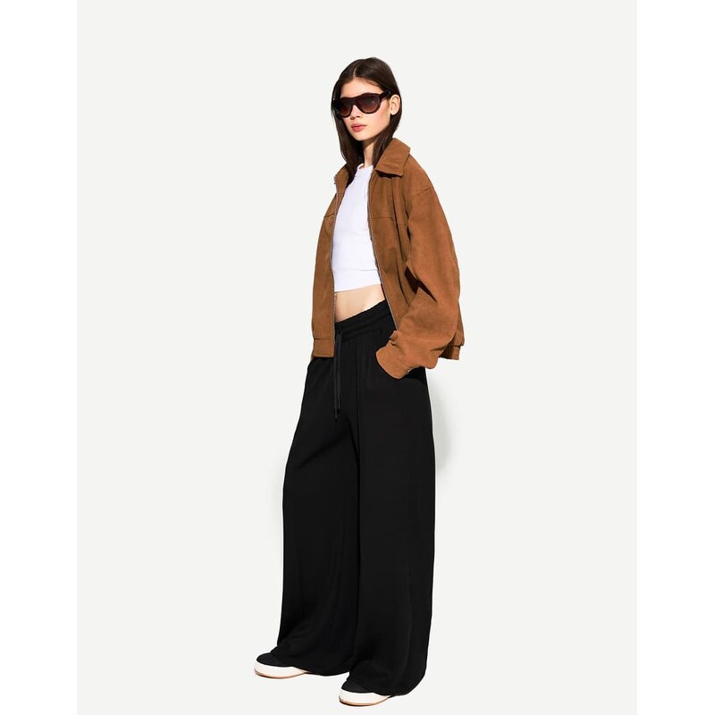 Bershka Soft touch wide-leg trousers in black