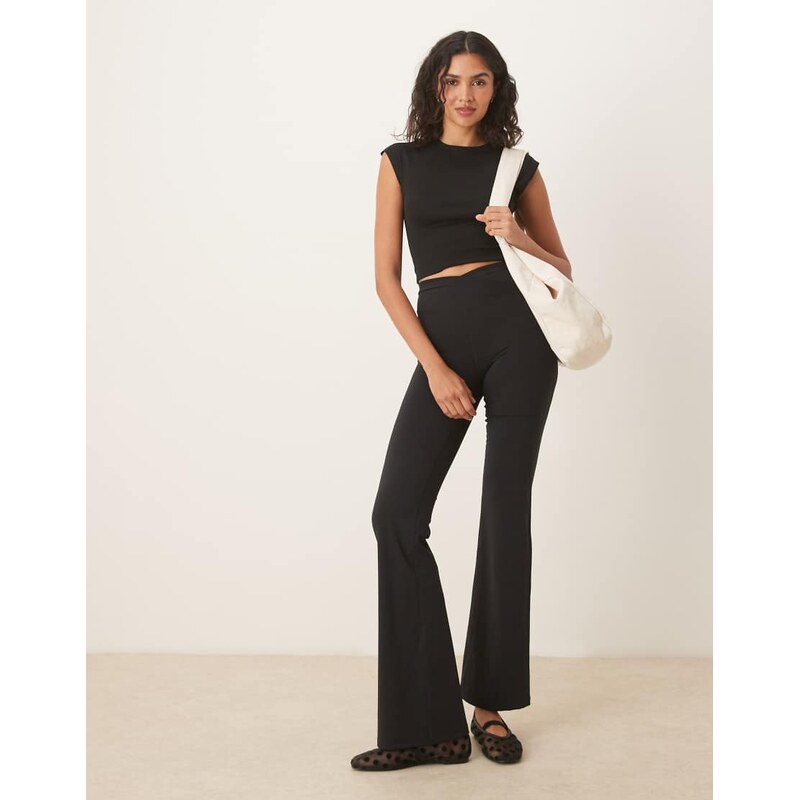 TALA DayFlex 30 wrap high waisted flared yoga pant in black