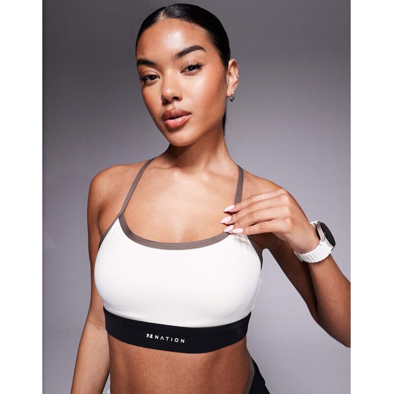 PE Nation Signature Sports Bra in whisper white and walnut