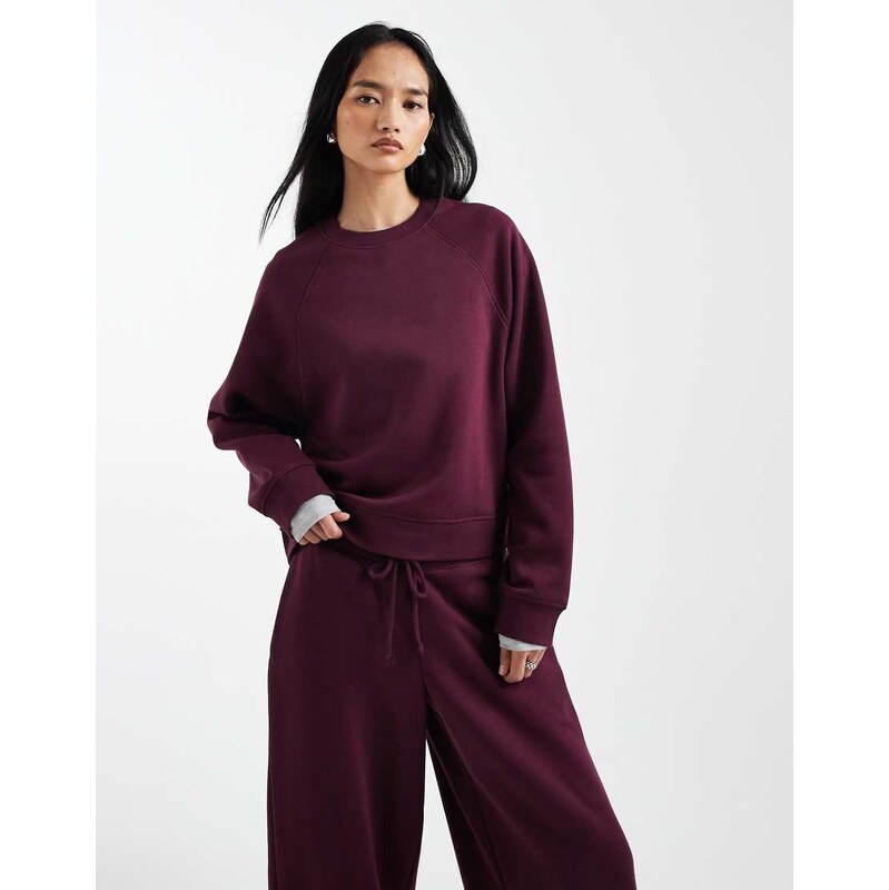 ASOS DESIGN oversized brushback sweatshirt with raglan detail in plum 112462919