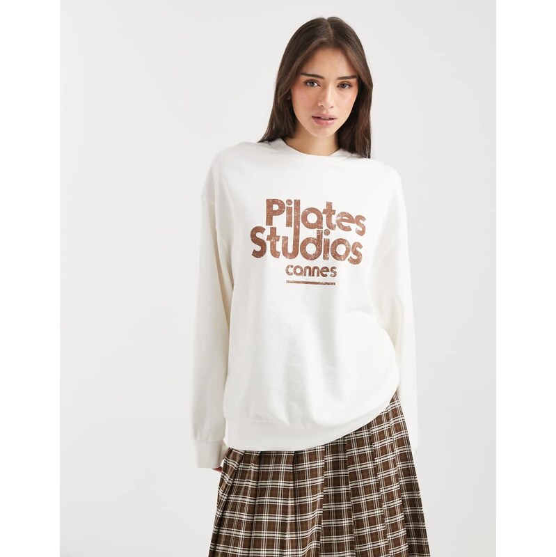 ASOS DESIGN oversized sweatshirt with pilates studio graphic in