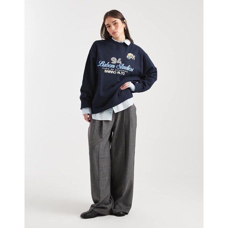 ASOS DESIGN oversized sweatshirt with Lisbon sports graphic in navy 115546230