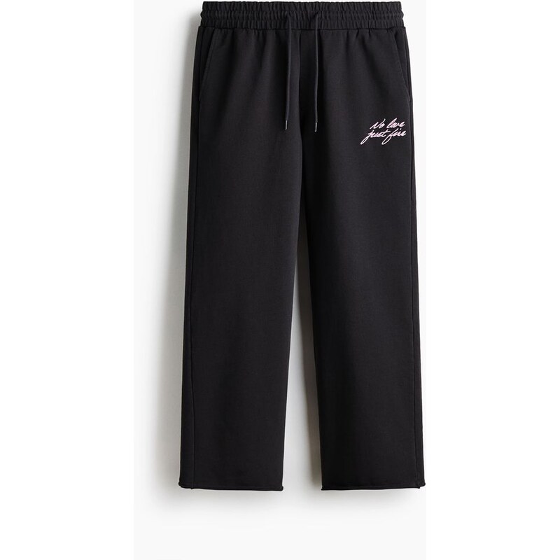 H&M - Bavlněné kalhoty jogger Relaxed Fit - Černá/No Love Just