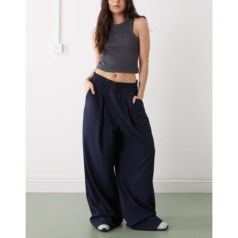 COLLUSION pull on trouser in navy pinstripe 112508667