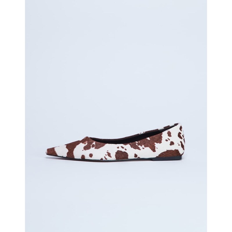 Topshop Ace point toe flat shoe in cow print hair on real leather 115514195