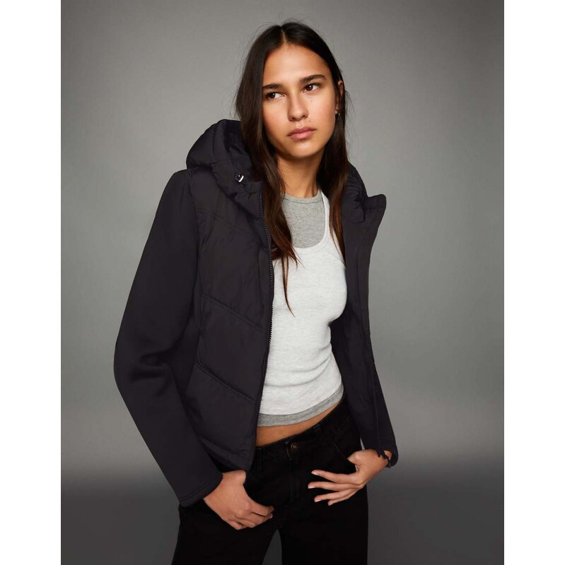 Bershka Combined hood jacket with neoprene effect in black 112544028