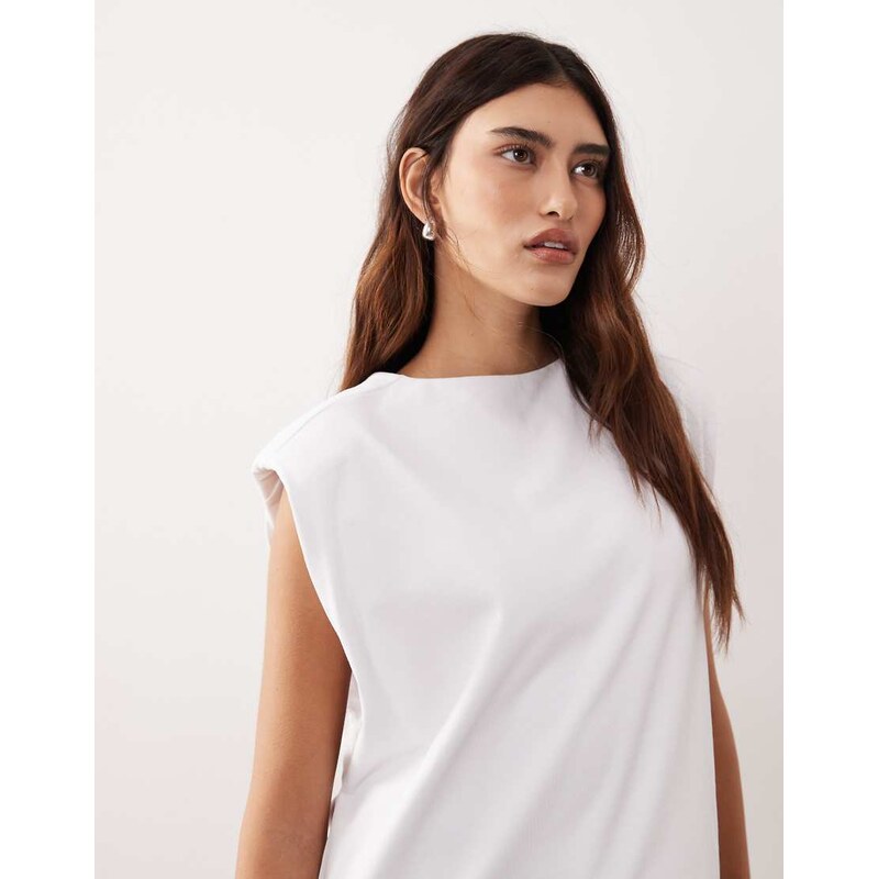 ARRANGE shoulder pad side split oversized sleeveless tee in