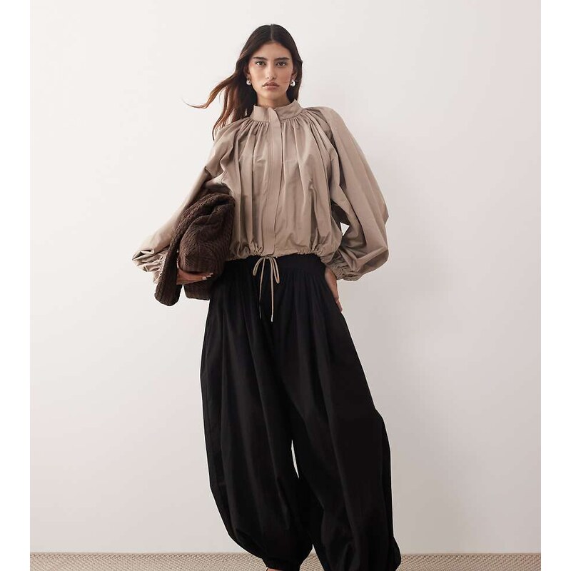 ARRANGE waist seam detail balloon cuffed trousers in black 115519167