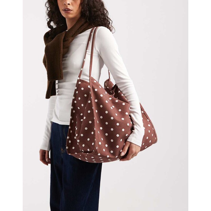 ASOS DESIGN tubular handle canvas tote bag in polka dot print