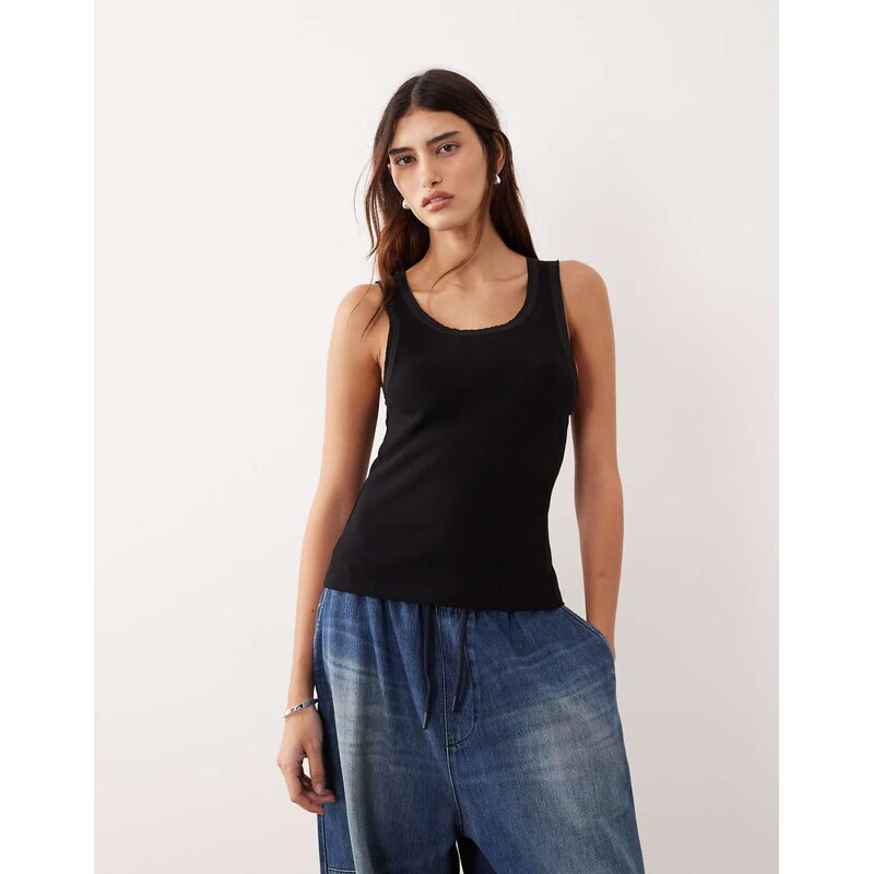 ARRANGE premium ribbed vest with raw cotton trim in black