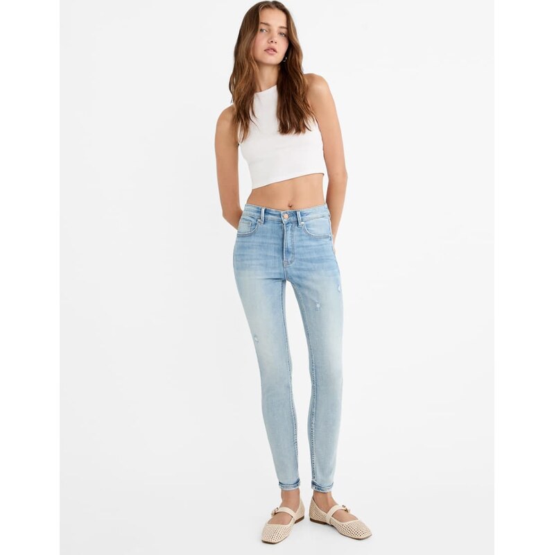 Stradivarius D07 regular waist skinny jeans in medium light blue denim 112653841