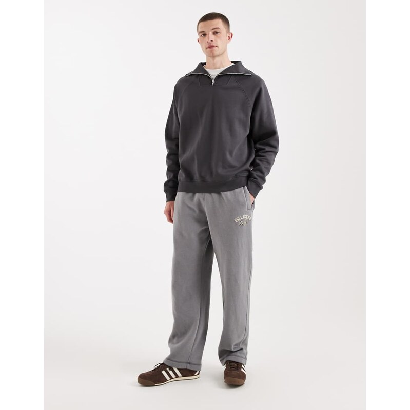 Hollister cuffed baggy joggers with logo graphic in navy