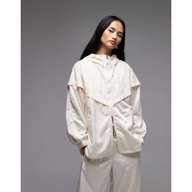 Nike oversized woven track jacket in cream-White
