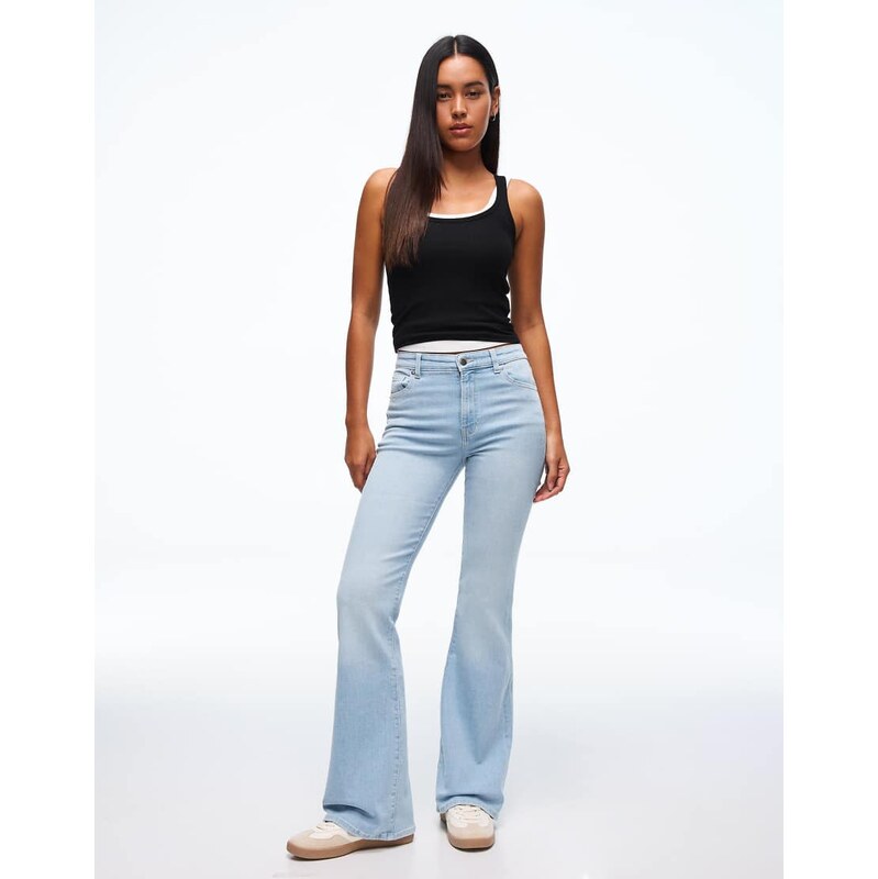 Bershka Petite flared jeans in light bue-Blue