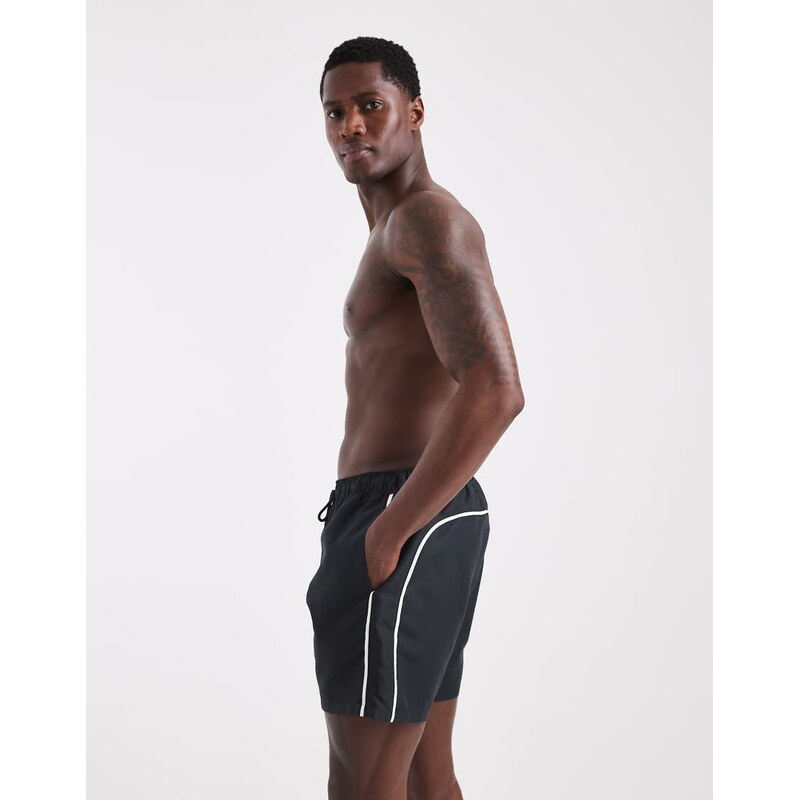 ASOS DESIGN swim shorts in mid length in black with contrast